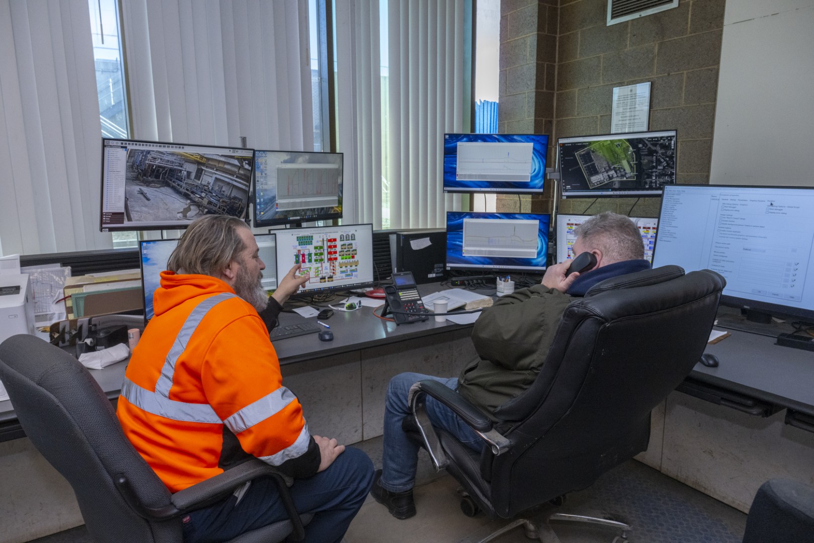 CCMUA operators monitoring advanced sewage treatment systems in regional wastewater treatment facility control room